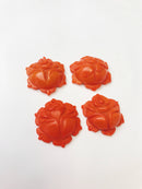 orange bamboo coral hand carved flower pendant