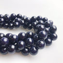 blue sandstone smooth round beads