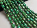 dark green turquoise smooth oval shape beads