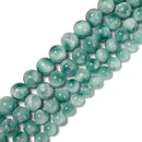 Iridescent Dark Green Moonstone Smooth Round Beads 14mm to 20mm 15.5'' Strand