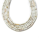 white turquoise round tube beads