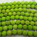 green turquoise hand carved round beads