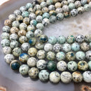 natural k smooth round beads