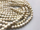 white turquoise smooth round beads