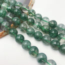 green rutilated quartz smooth round beads
