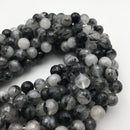 black tourmalinated quartz faceted round beads