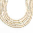 river stone round tube beads