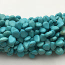 blue turquoise smooth flat teardrop shape beads