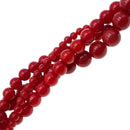 red bamboo coral smooth round beads 