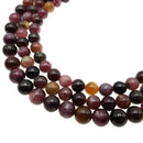dark multi color tourmaline smooth round