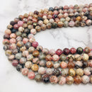 natural rhodochrosite faceted round beads