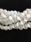 white cats eye smooth round beads