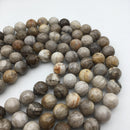 silver leaf jasper faceted round beads