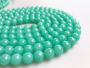 teal green quartz smooth round beads