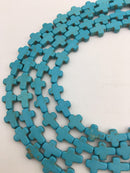 blue or white howlite turquoise cross beads 