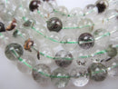 green rutilated quartz smooth round beads