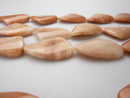 pink aventurine smooth twisted triangle shape beads