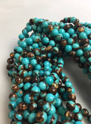 bronzite turquoise smooth round beads