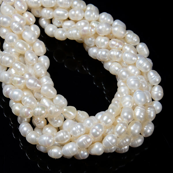 Grade A White Fresh Water Pearl Rice Shape Beads Size 6x7mm 15'' Strand