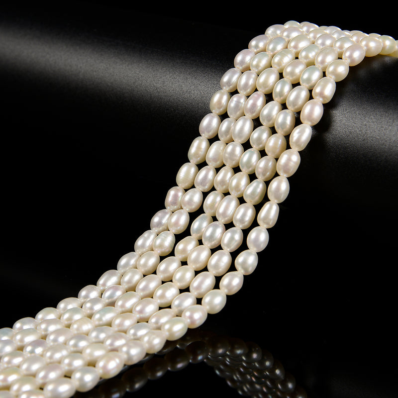 Grade A White Fresh Water Pearl Rice Shape Beads Size 5x6mm 15'' Strand