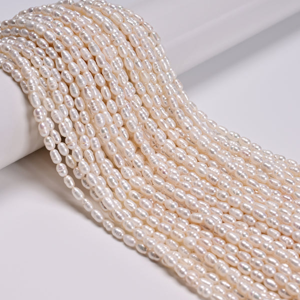 White Fresh Water Pearl Ringed Rice Shape Beads Size 3-4x5-6mm 14'' Strand