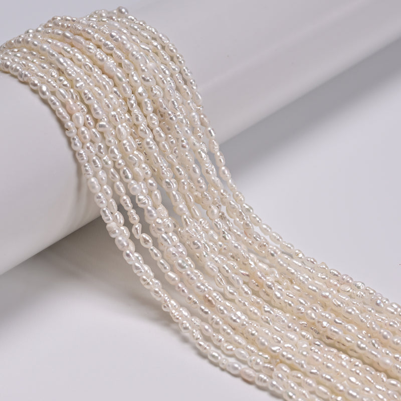 Fresh water Pearl White Ringed Rice Shape Beads Size 2-2.5x3-4.5mm 14" Strand