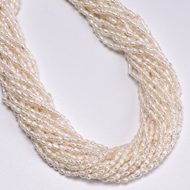 Fresh water Pearl White Ringed Rice Shape Beads Size 2-2.5x3-4.5mm 14" Strand