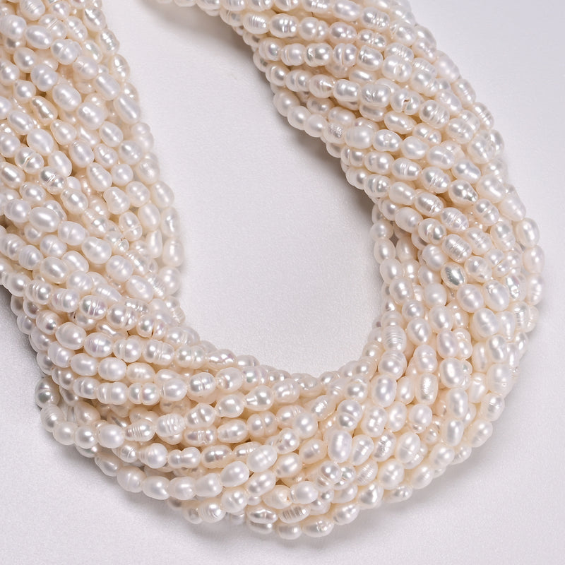 White Fresh Water Pearl Ringed Rice Shape Beads Size 3mm x 4-5mm 14'' Strand