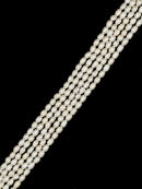 White Fresh Water Pearl Rice Shape Beads Size 4x6mm 14'' Strand