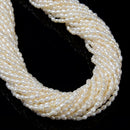 White Fresh Water Pearl Rice Shape Beads Size 3mm x 3-4mm 14'' Strand