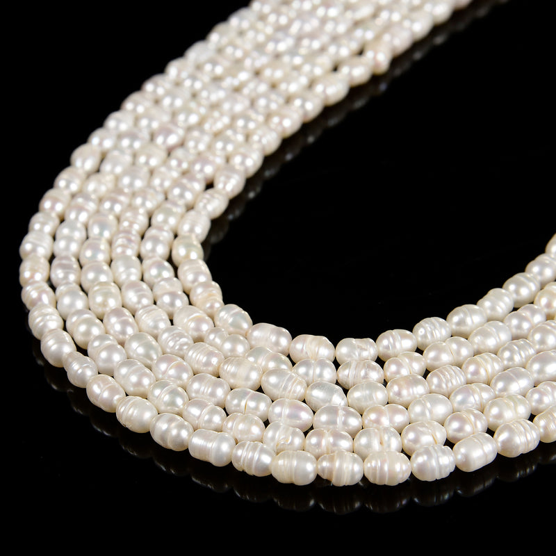 White Fresh Water Pearl Rice Shape Beads Size 4x6mm 14'' Strand