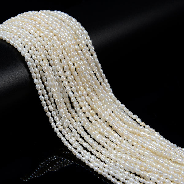 White Fresh Water Pearl Rice Shape Beads Size 3mm x 3-4mm 14'' Strand