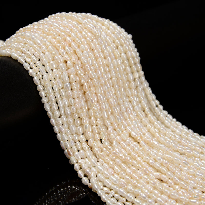 White Fresh Water Pearl Ringed Rice Shape Beads Size 3mm x 4-5mm 14'' Strand