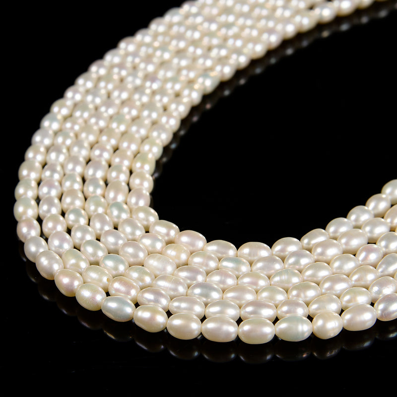 Grade A White Fresh Water Pearl Rice Shape Beads Size 5x6mm 15'' Strand