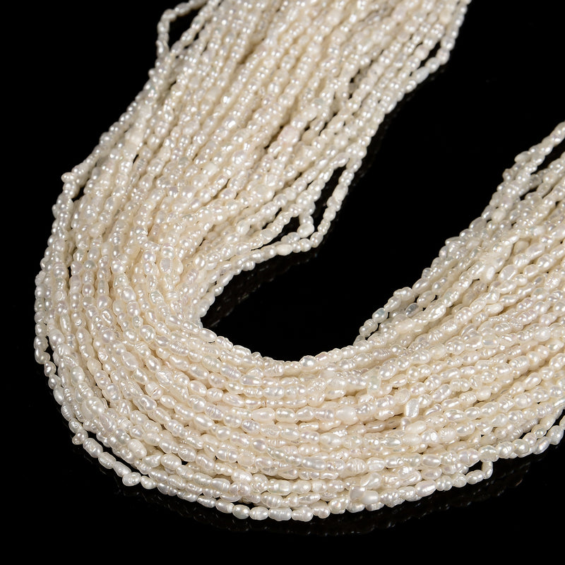 White Fresh Water Pearl Rice Shape Beads Size 2x3mm 12.5'' Strand