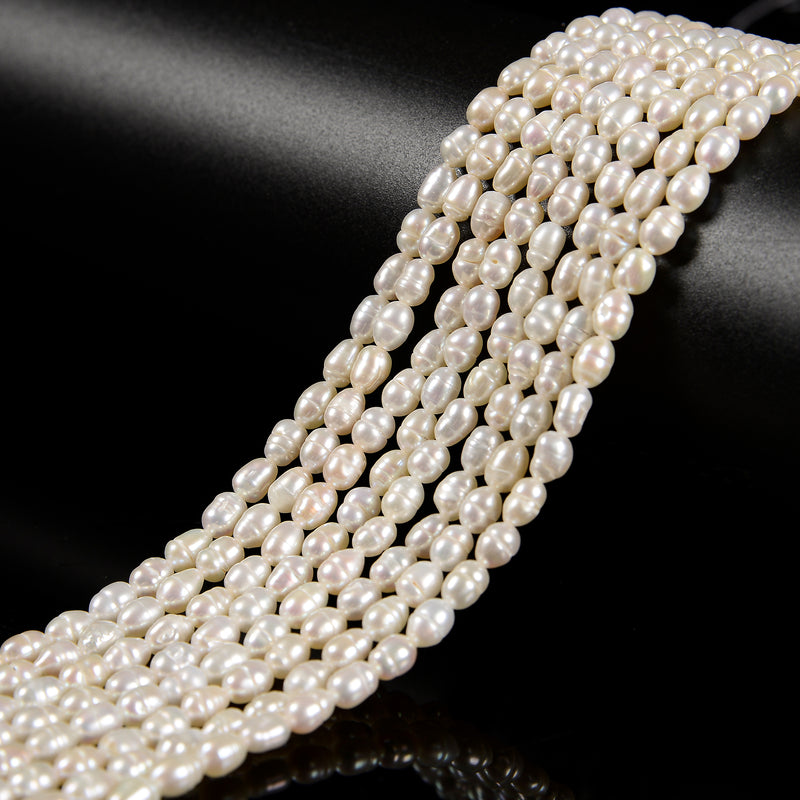 White Fresh Water Pearl Rice Shape Beads Size 4x5mm 14'' Strand