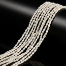 White Fresh Water Pearl Rice Shape Beads Size 2x3mm 12.5'' Strand