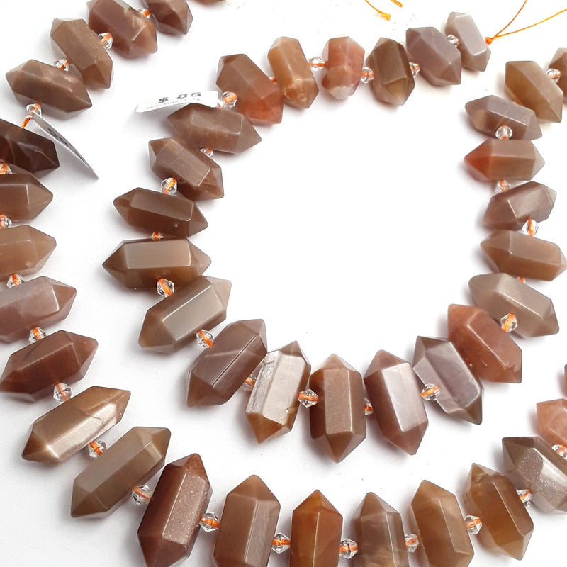 peach moonstone graduated center drill points beads