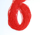 red orange bamboo coral smooth round beads