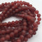 dark carnelian matte round beads