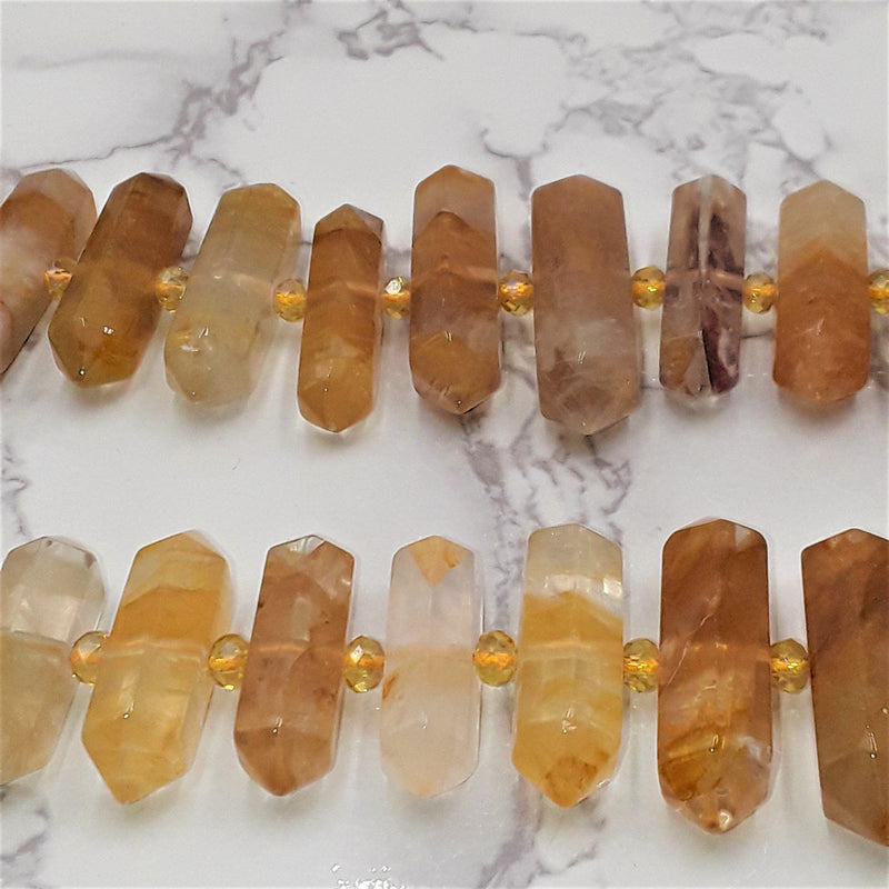 natural citrine graduated center drill faceted points beads