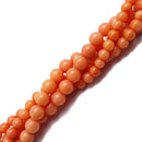 peach bamboo coral smooth round beads