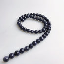 blue sandstone smooth round beads