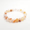 red dendritic montana agate bracelet smooth round