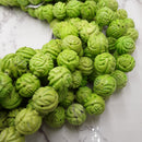 green turquoise hand carved round beads
