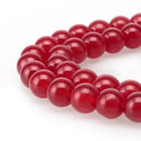 red dyed jade smooth round beads