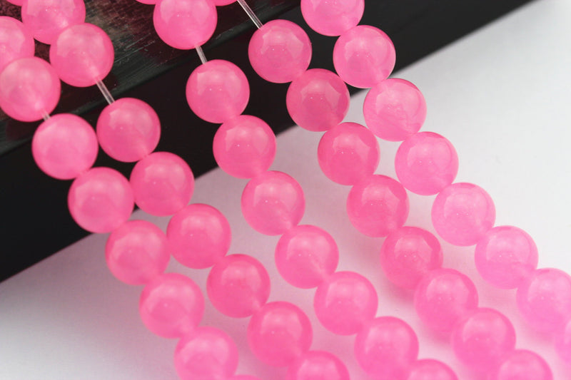 dark pink dyed jade smooth round beads