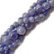 high quality purple tanzanite smooth round beads