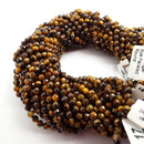 yellow Tiger's eye hard cut faceted round beads
