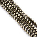 gold pyrite smooth round beads 